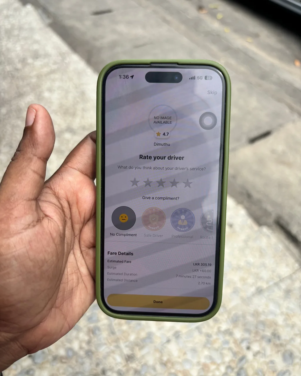 Rate-your-driver screen with fare details after a PickMe trip
