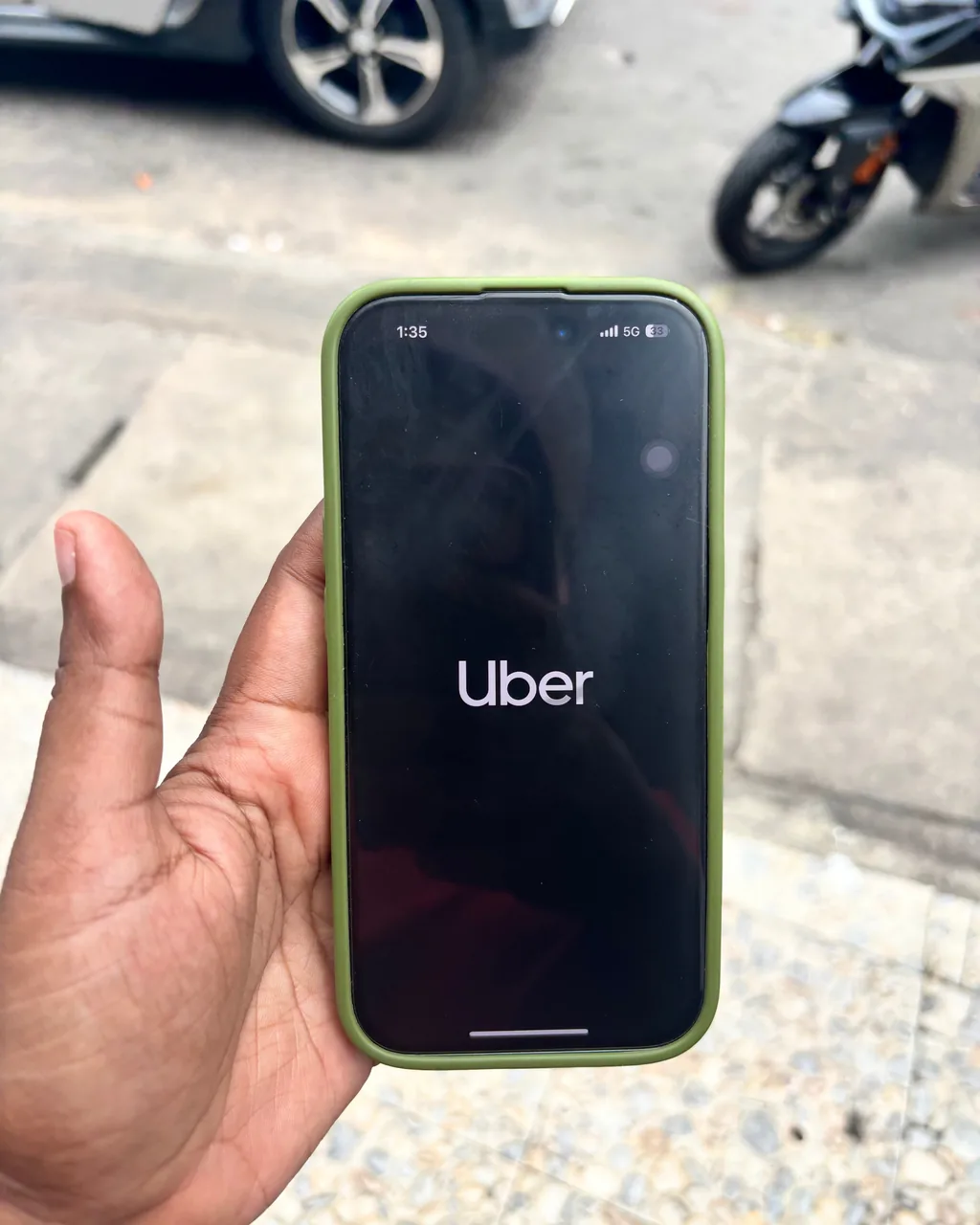 Uber app loading screen on a phone in Sri Lanka