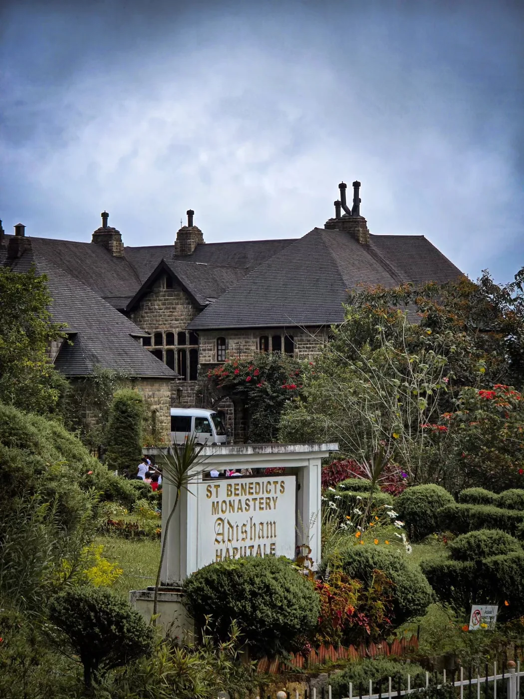 St Benedicts Monastery sign in front of Adisham Bungalow, Haputale