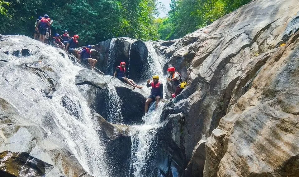 Rock sliding and canyoning beside a waterfall at the Kitulgala adventure camp