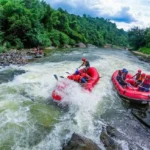 Two rafts running the rapids on the Kelani River at Kitulgala, Sri Lanka