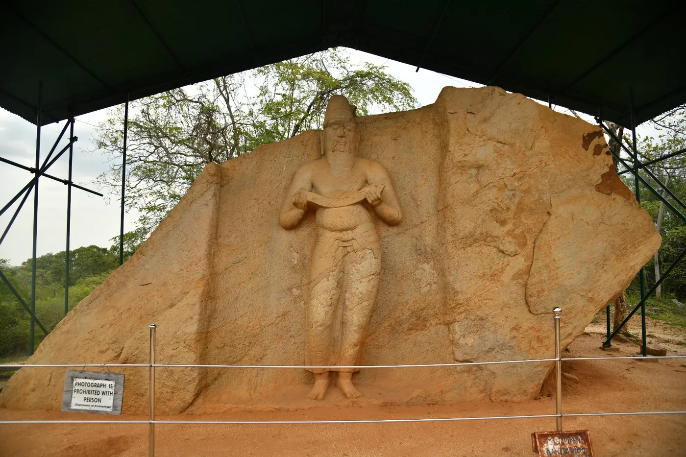 Rock-carved statue believed to depict King Parakramabahu the Great near Polonnaruwa